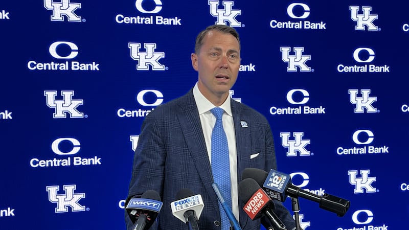 J Batt speaks at news conference after being named UK's new athletics director.