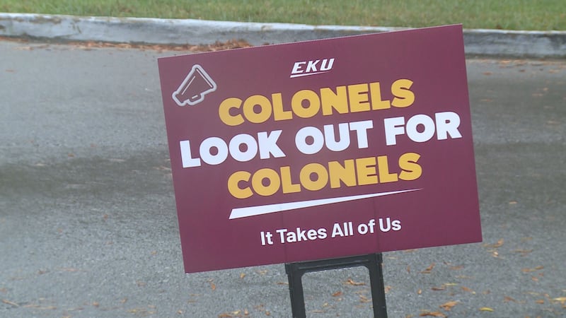 A sign on Eastern Kentucky University's campus that says "Colonels look out for Colonels."
