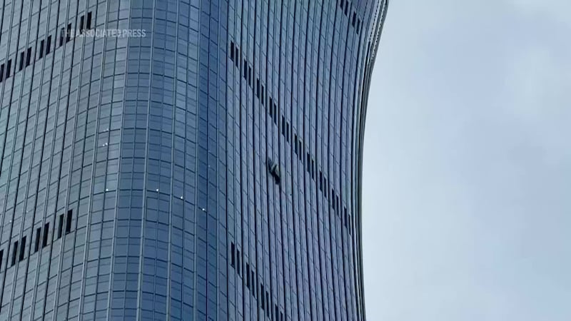 A small aircraft crashed into Beijing’s tallest building. (Source: ASSOCIATED PRESS)